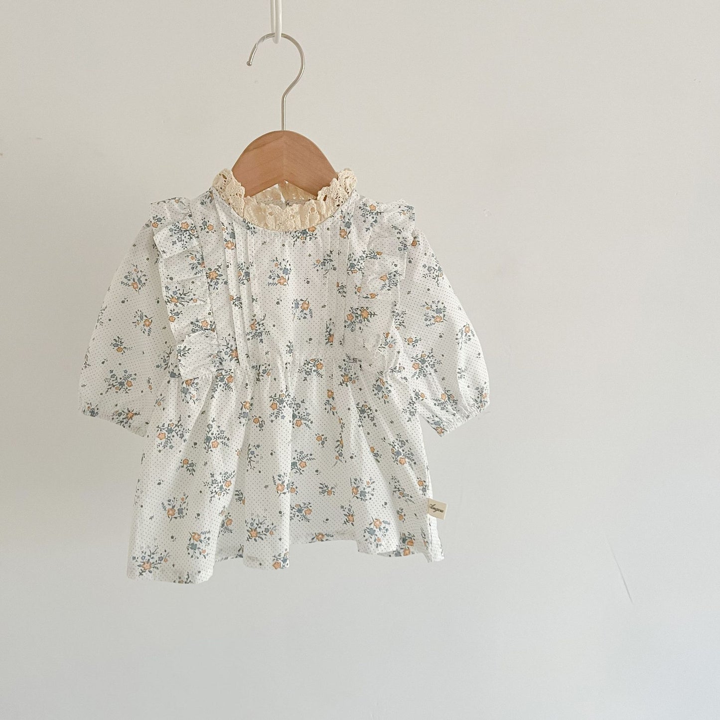 White romper or dress with flowers. Matching dress for little sisters