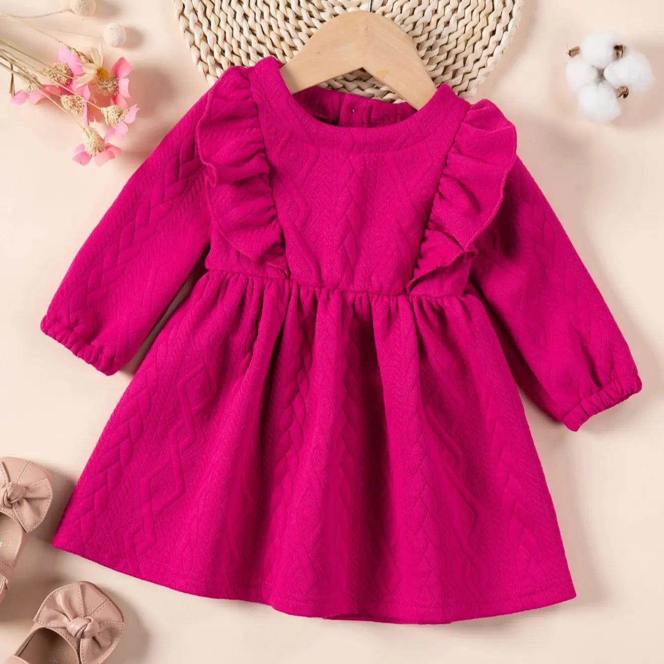 Vestido para bebé niña con volantes en el pecho