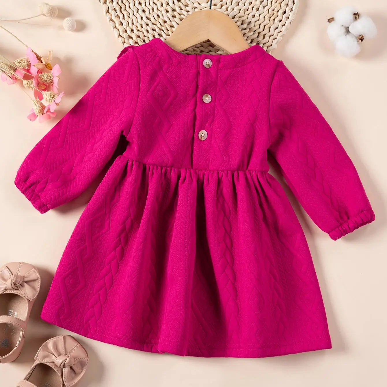 Vestido para bebé niña con volantes en el pecho